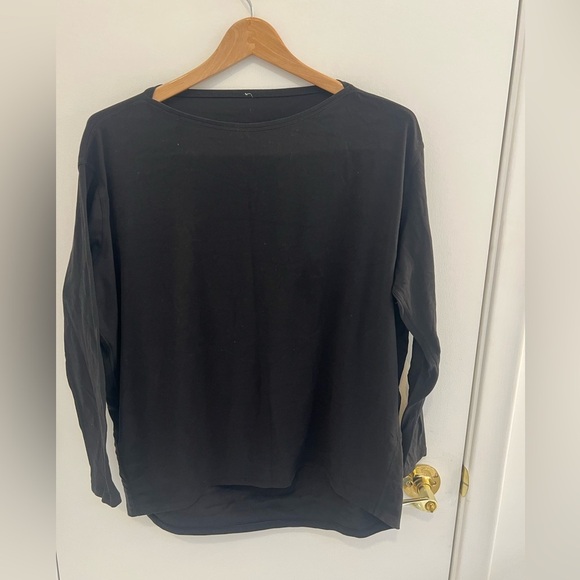Lululemon Back In Action Long Sleeve
Tee Black - Size tag cut off - see pics - Picture 1 of 6